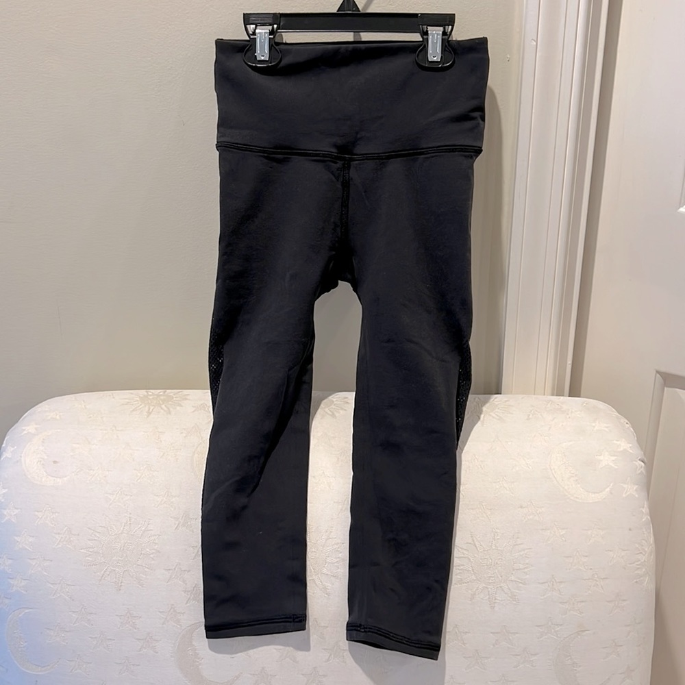 Lululemon crop leggings, with cutout detail. Size 2